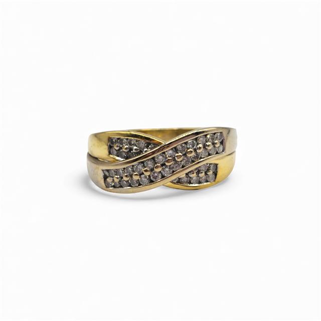 18ct yellow gold diamond crossover ring with sparkling diamonds, showcasing elegant design and fine craftsmanship.