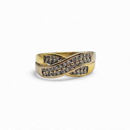 18ct yellow gold diamond crossover ring with sparkling diamonds, showcasing elegant design and fine craftsmanship.