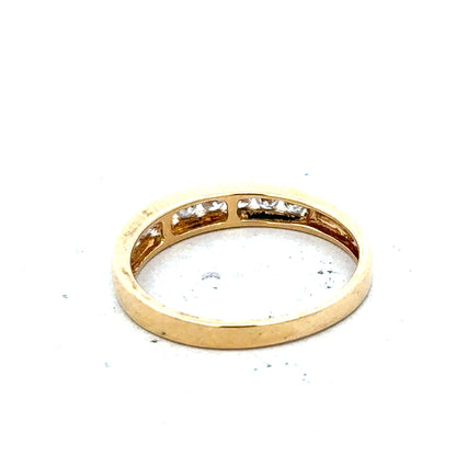 18ct yellow gold diamond half eternity ring with a continuous row of sparkling diamonds in a luxurious band
