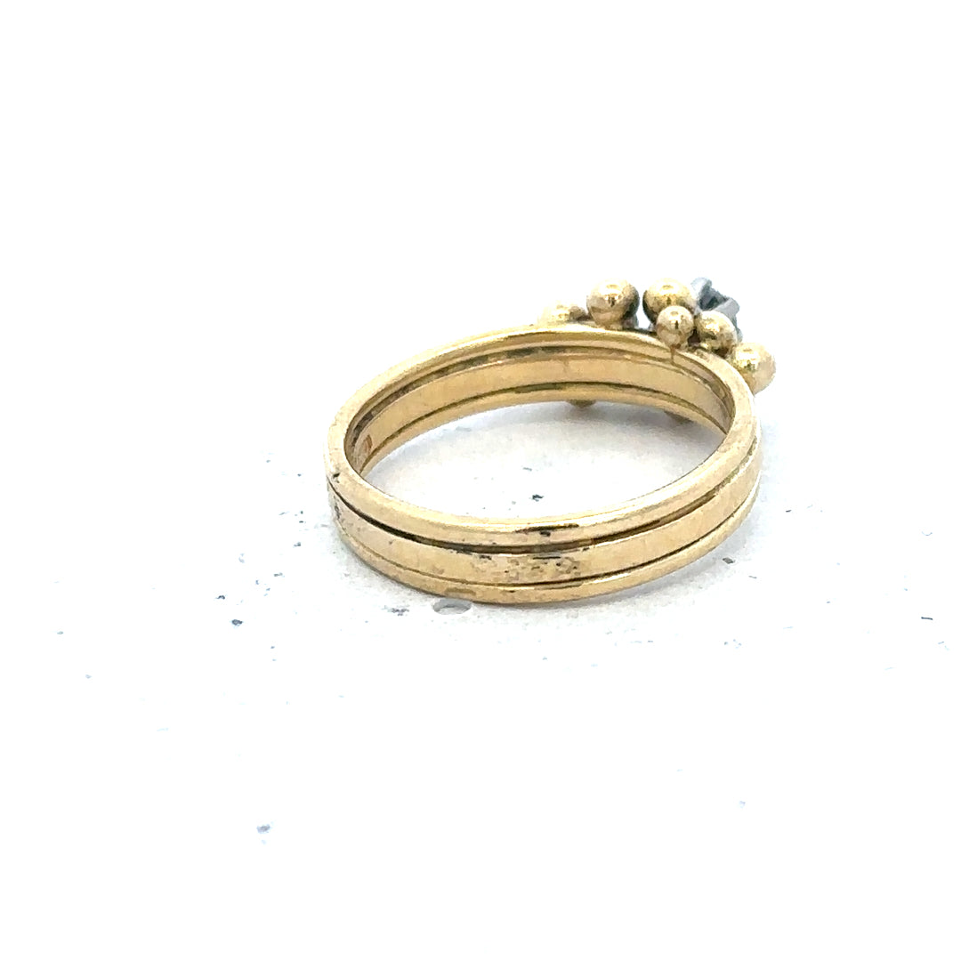 18ct yellow gold diamond ring in size I with sparkling diamonds and a classic band design.
