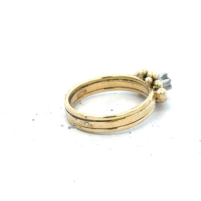 18ct yellow gold diamond ring in size I, featuring a sparkling diamond and elegant design.