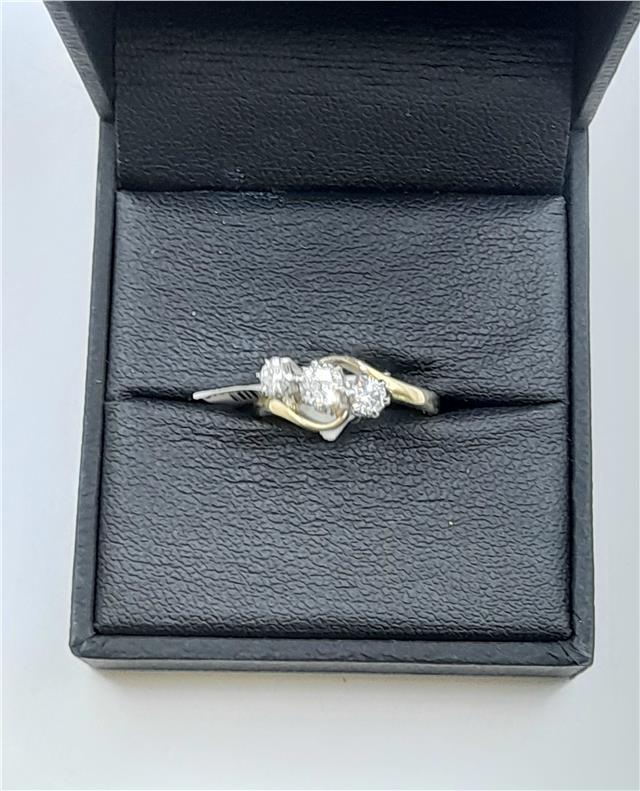 18ct yellow gold diamond ring in size J with a delicate design, weighing 2.4 grams. Unbranded jewelry with sparkling diamonds.