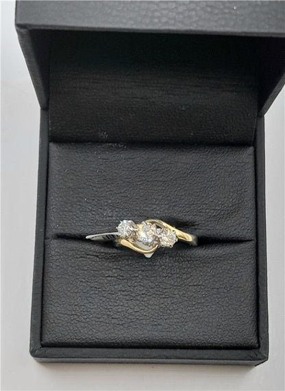 18ct yellow gold diamond ring in size J with a delicate band, weighing 2.4g, featuring sparkling diamonds.