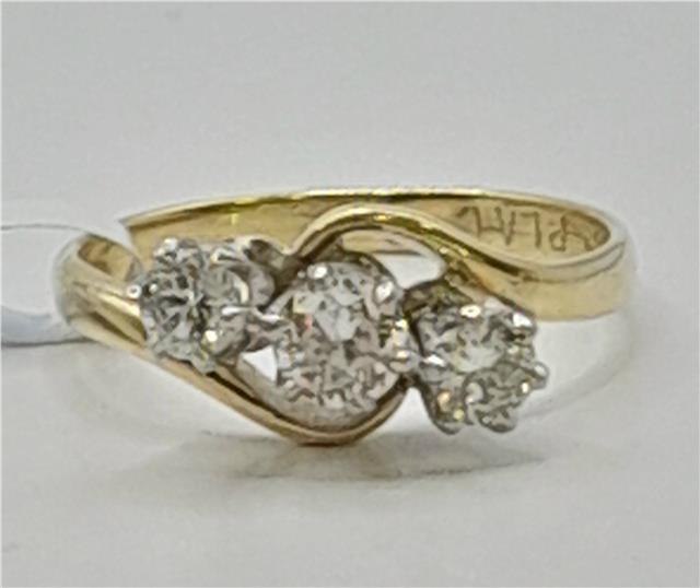 18ct yellow gold diamond ring, size J, featuring sparkling diamonds and a sleek band design. Weighs 2.4g.