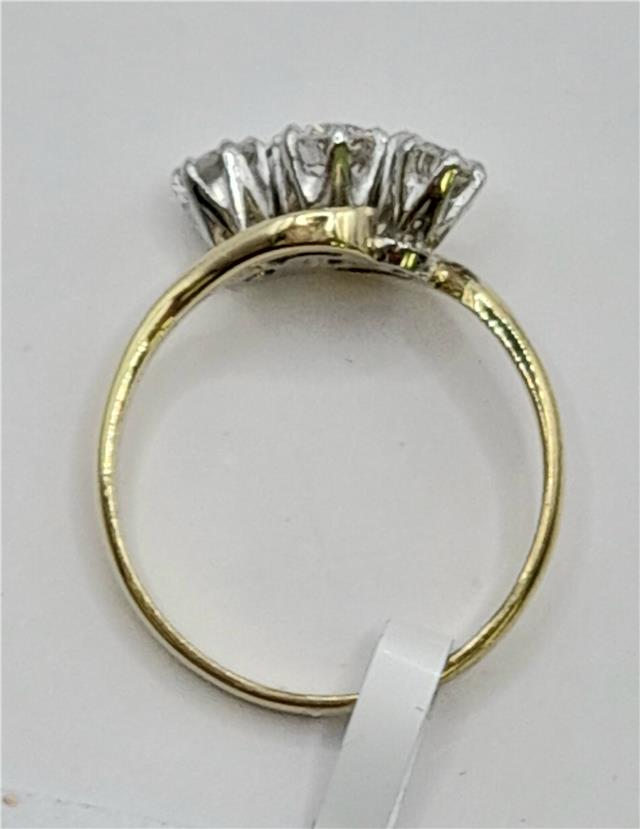 18ct yellow gold diamond ring in size J, featuring a delicate design and weighing 2.4 grams.