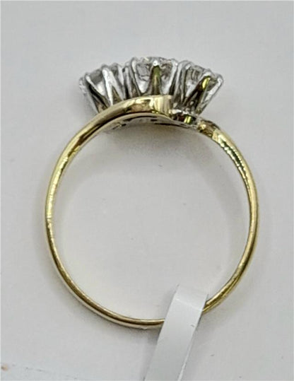 18ct yellow gold diamond ring in size J, featuring a delicate design and weighing 2.4 grams.
