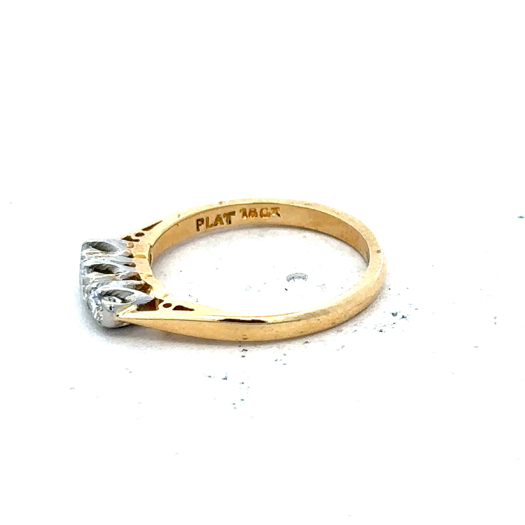 18ct yellow gold diamond ring in size J, featuring sparkling diamonds and weighing 2.5 grams.