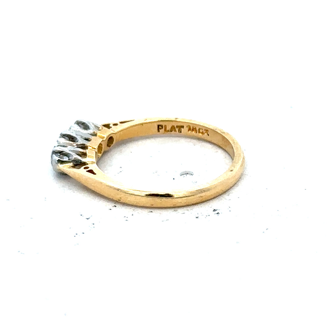 18ct yellow gold diamond ring in size J, 2.5g, featuring sparkling diamonds on a sleek band.