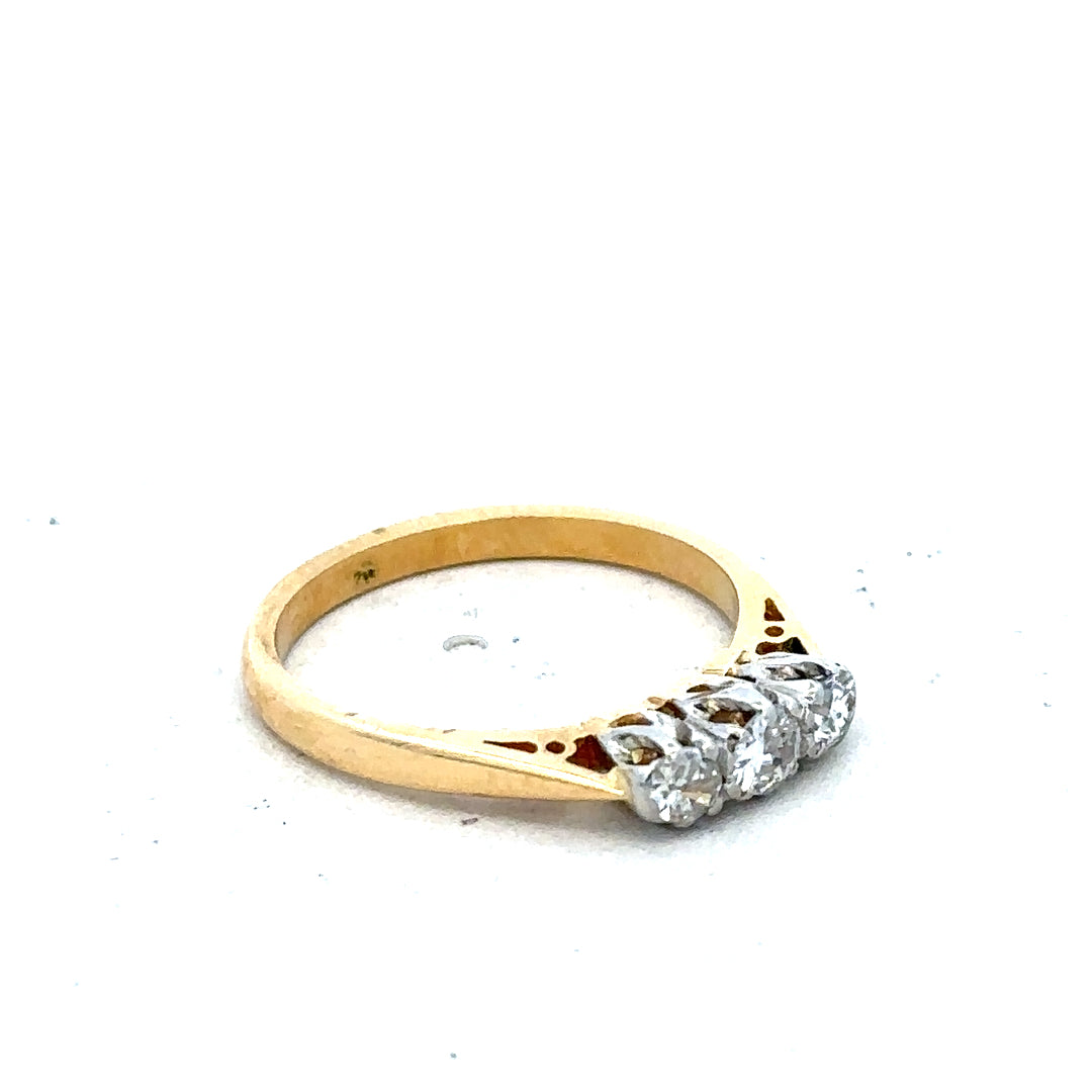 18ct yellow gold diamond ring in size J, featuring sparkling diamonds and a delicate design, weighs 2.5 grams.