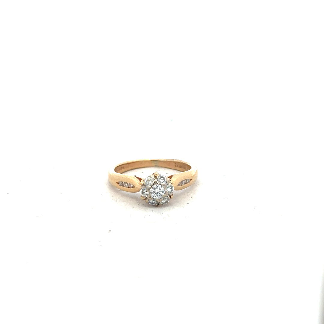 18ct yellow gold diamond ring in size J featuring sparkling diamonds, crafted with elegant and classic design.