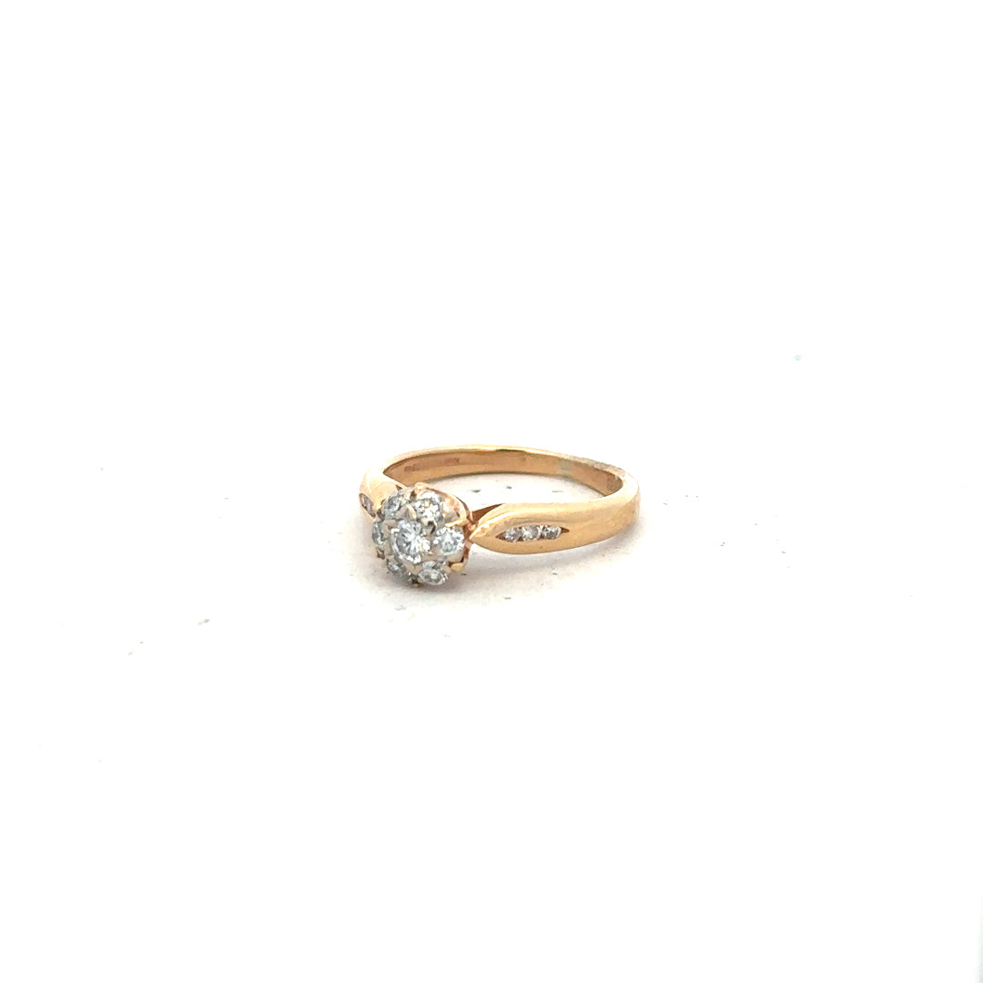 18ct yellow gold diamond ring in size J with sparkling diamonds, showcasing elegant craftsmanship and classic jewelry design.