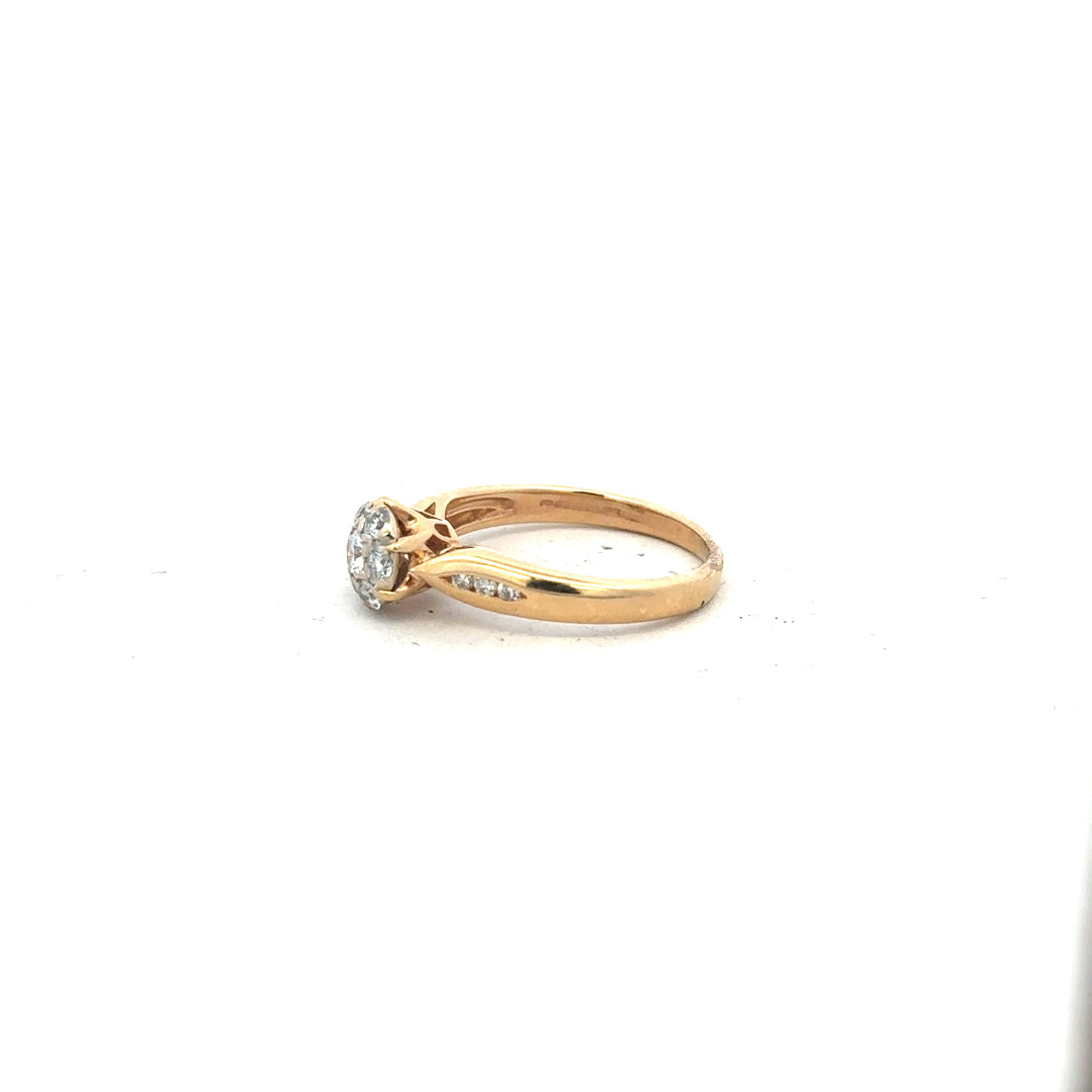 18ct yellow gold diamond ring in size J with sparkling diamonds, unbranded jewelry piece.
