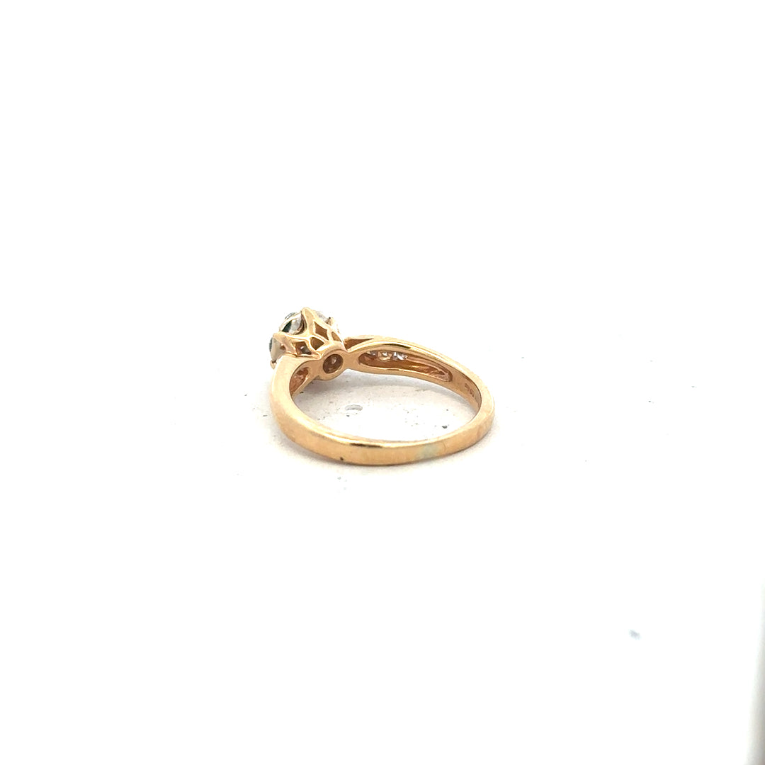 18ct yellow gold diamond ring in size J with sparkling diamonds, elegant jewelry piece with intricate design.