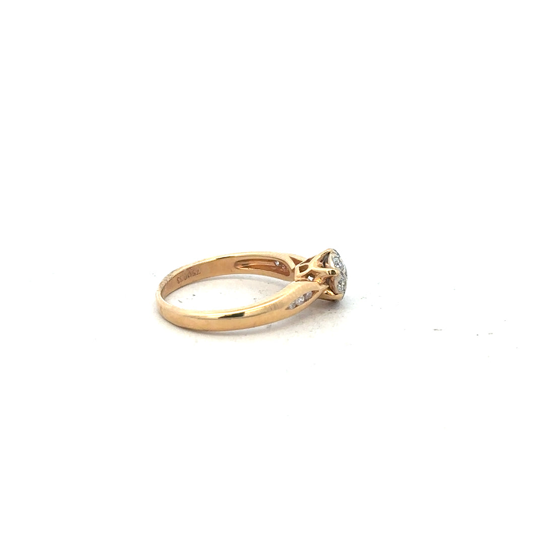 18ct yellow gold diamond ring in size J with sparkling diamonds, showcasing elegant craftsmanship and a classic design
