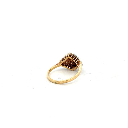 18ct yellow gold diamond ring in size J with sparkling diamonds, showcasing elegant craftsmanship and a classic design.