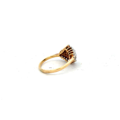 18ct yellow gold diamond ring in size J with sparkling diamonds, showcasing elegant craftsmanship and classic design.