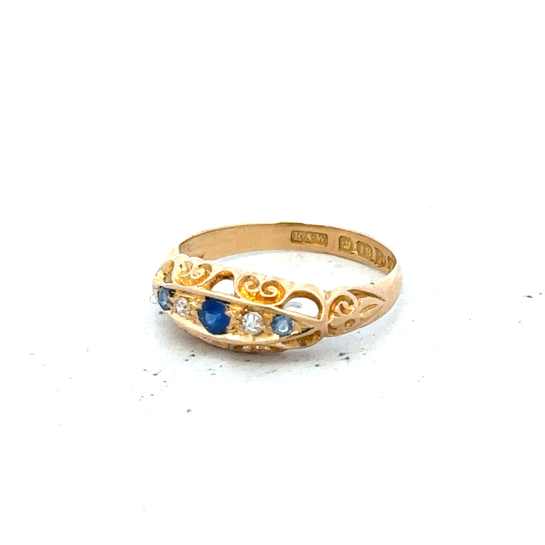 18ct yellow gold diamond ring in size J with sparkling diamonds, showcasing fine craftsmanship and elegant design.