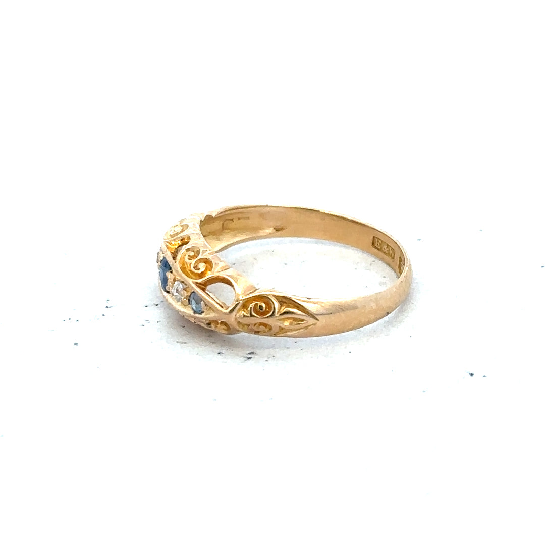 18ct yellow gold diamond ring in size J with sparkling diamonds, unbranded jewelry piece.