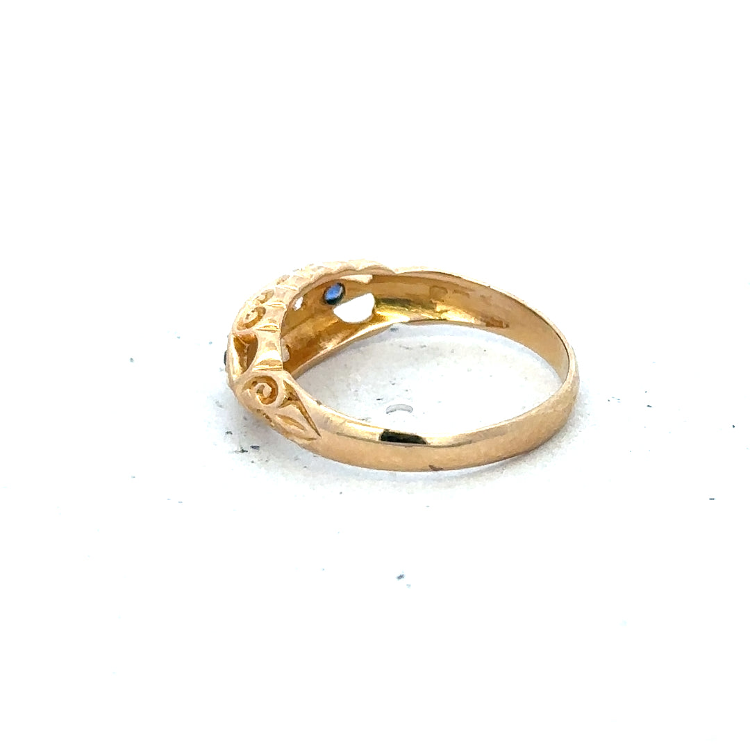 18ct yellow gold diamond ring in size J with sparkling diamonds, showcasing elegant craftsmanship and a classic design.