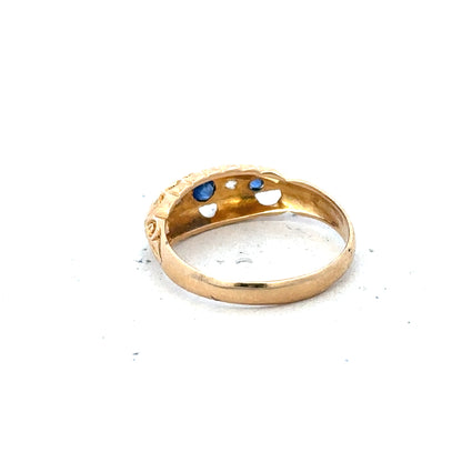 18ct yellow gold diamond ring in size J with sparkling diamonds, elegant jewelry piece.