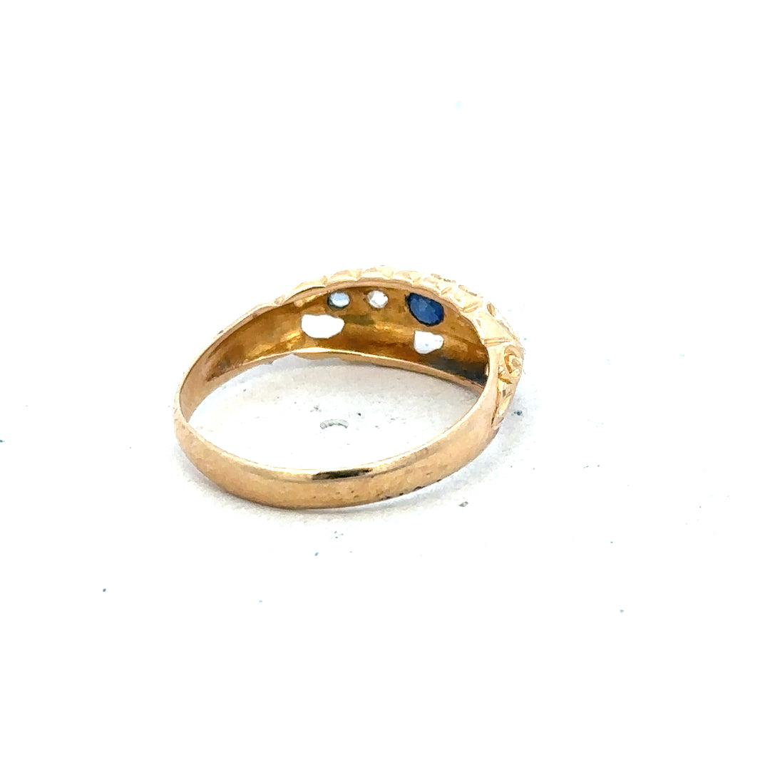 18ct yellow gold diamond ring in size J with sparkling diamonds, showcasing elegant jewelry design.