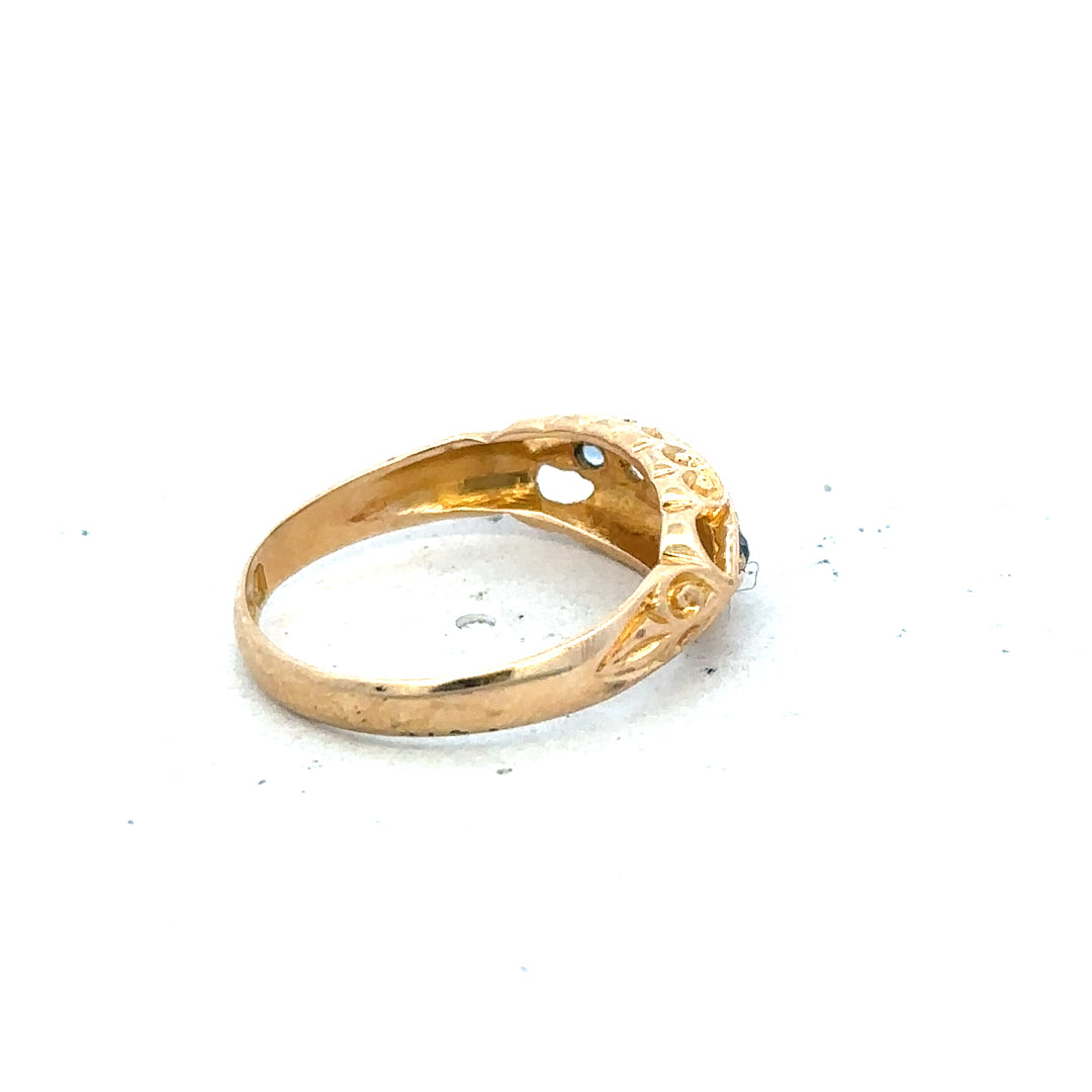 18ct yellow gold diamond ring in size J with sparkling diamonds, showcasing elegant jewelry craftsmanship.