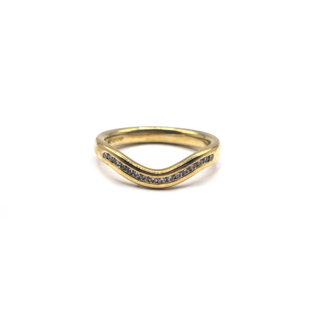 18ct yellow gold diamond ring in size K with sparkling diamonds, featuring a classic and elegant design.
