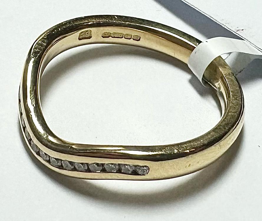 18ct yellow gold diamond ring in size K, featuring a sparkling diamond, unbranded jewelry designed for elegant wear.