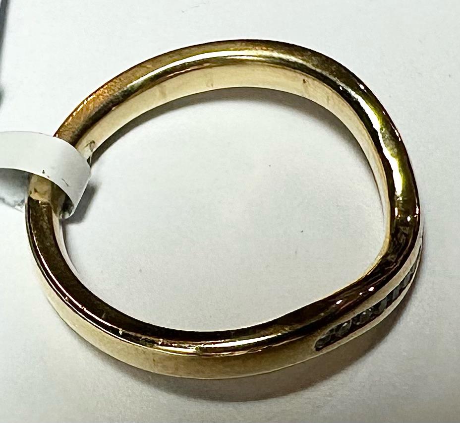18ct yellow gold diamond ring in size K with sparkling diamonds, showcasing an elegant and classic jewelry design.