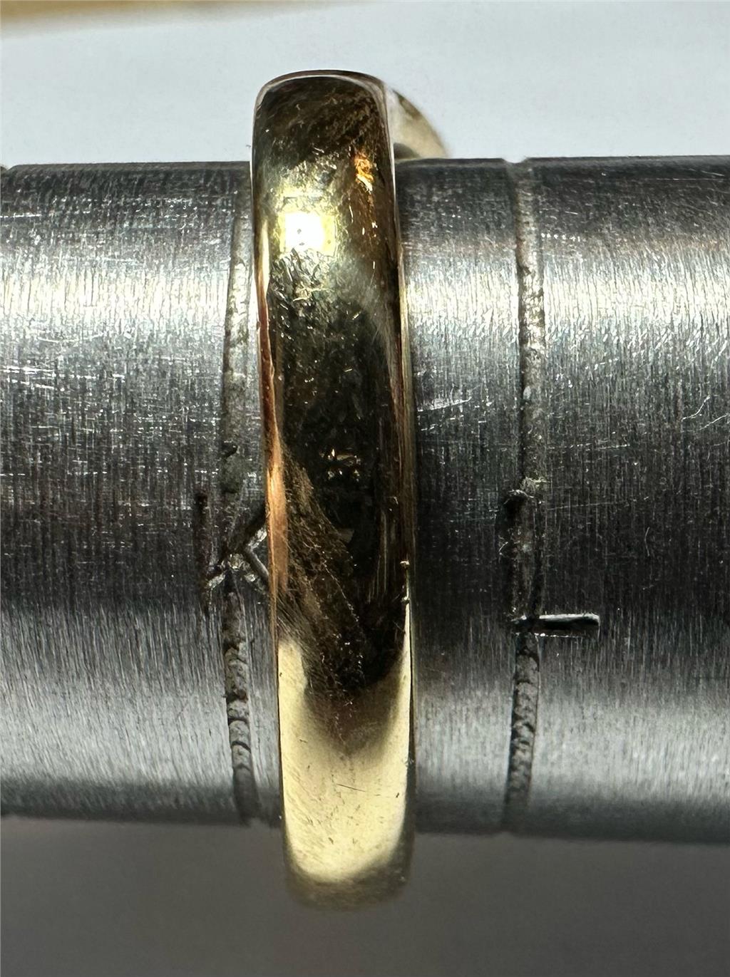 18ct yellow gold diamond ring in size K with sparkling diamonds, unbranded, showcasing elegant jewelry design.