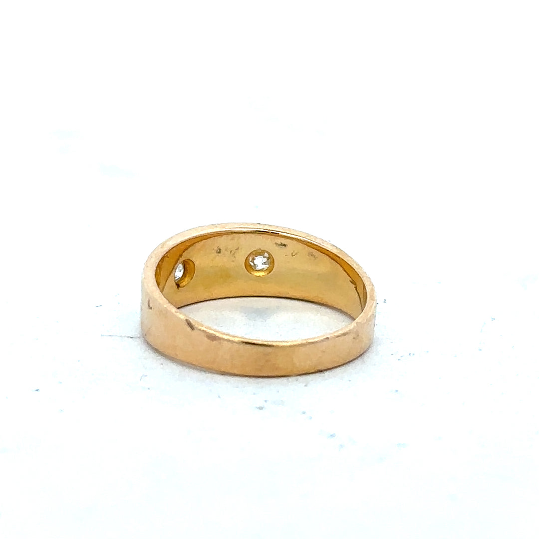 18ct yellow gold diamond ring in size K with sparkling diamonds on a sleek band, unbranded jewelry image.