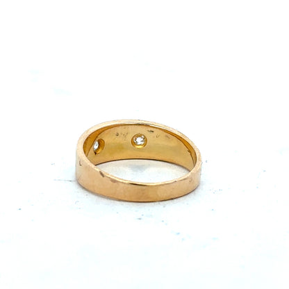 18ct yellow gold diamond ring in size K with sparkling diamonds on a sleek band, unbranded jewelry image.