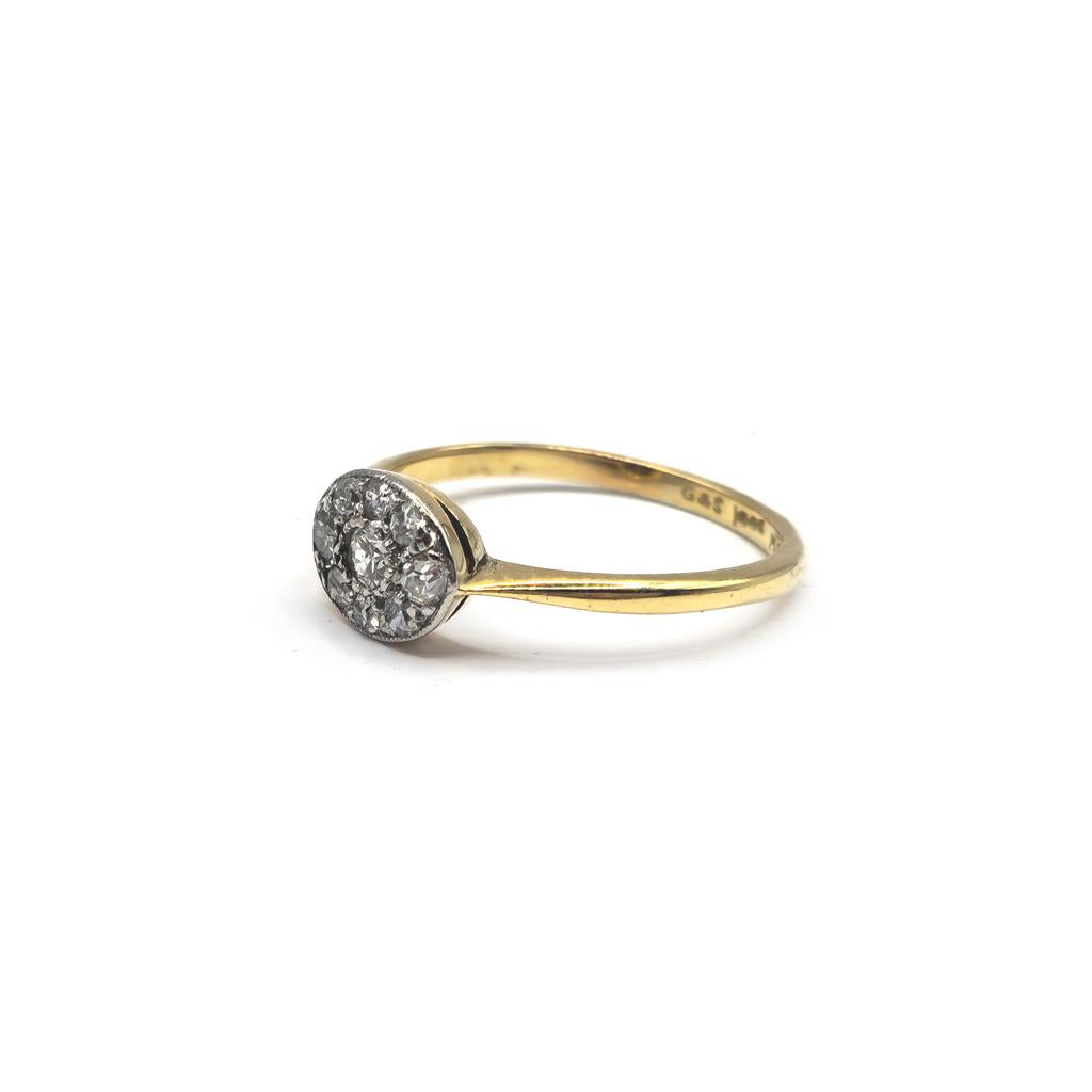 18ct yellow gold diamond ring in size K1/2 featuring sparkling diamonds on a sleek band.