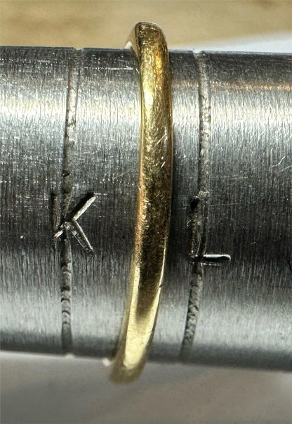 18ct yellow gold diamond ring size K1/2 with sparkling diamonds, elegant jewelry piece showcasing craftsmanship and fine details.