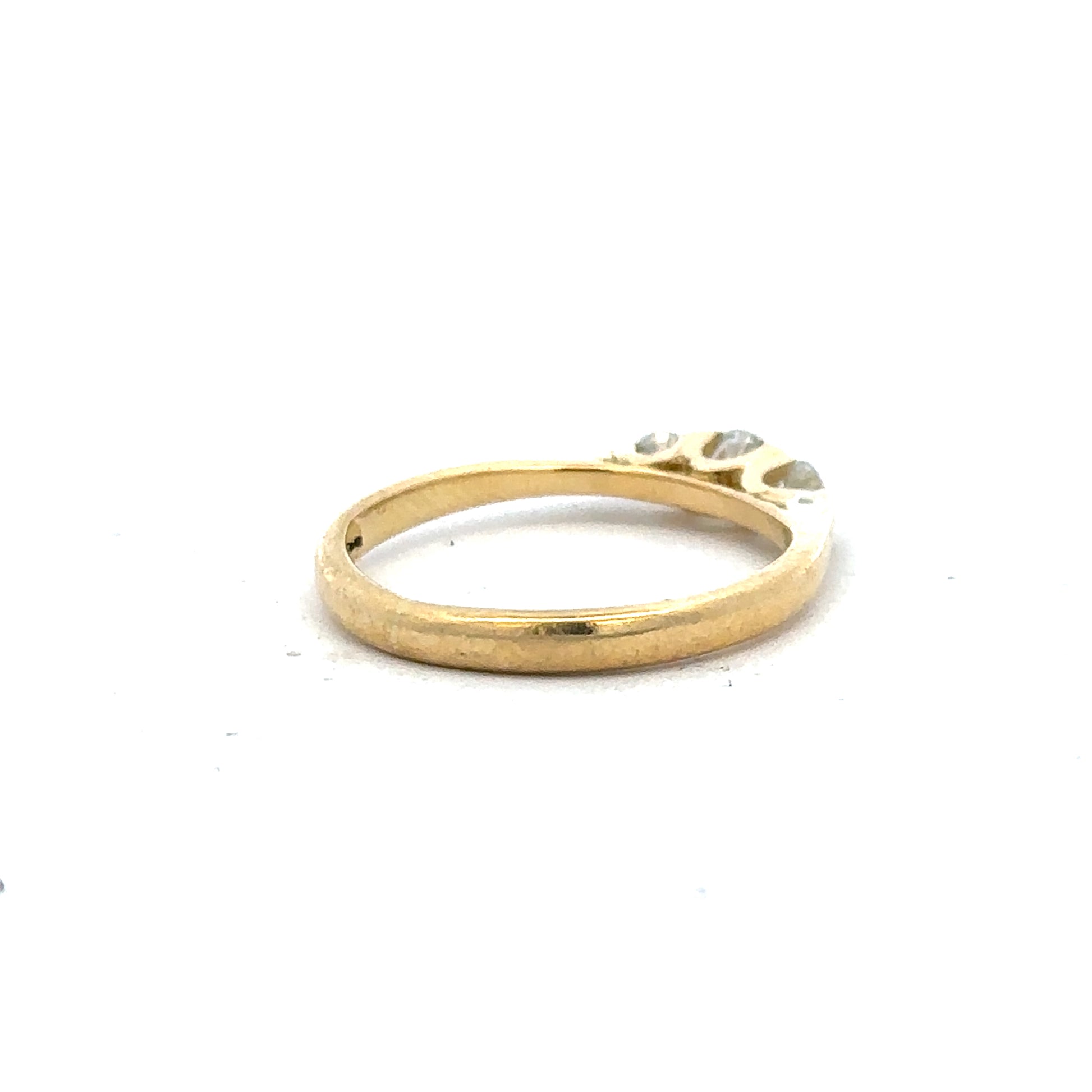 18ct yellow gold diamond ring in size L with sparkling diamonds, showcasing elegant craftsmanship and a classic design.