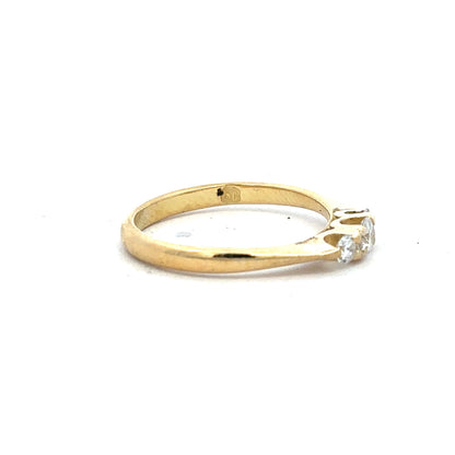 18ct yellow gold diamond ring in size L with sparkling diamonds, elegant jewelry piece showcasing fine craftsmanship.