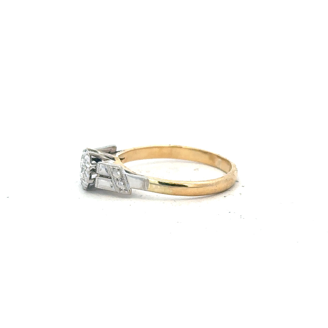 18ct yellow gold diamond ring in size L with sparkling diamonds, showcasing a sleek and elegant design.