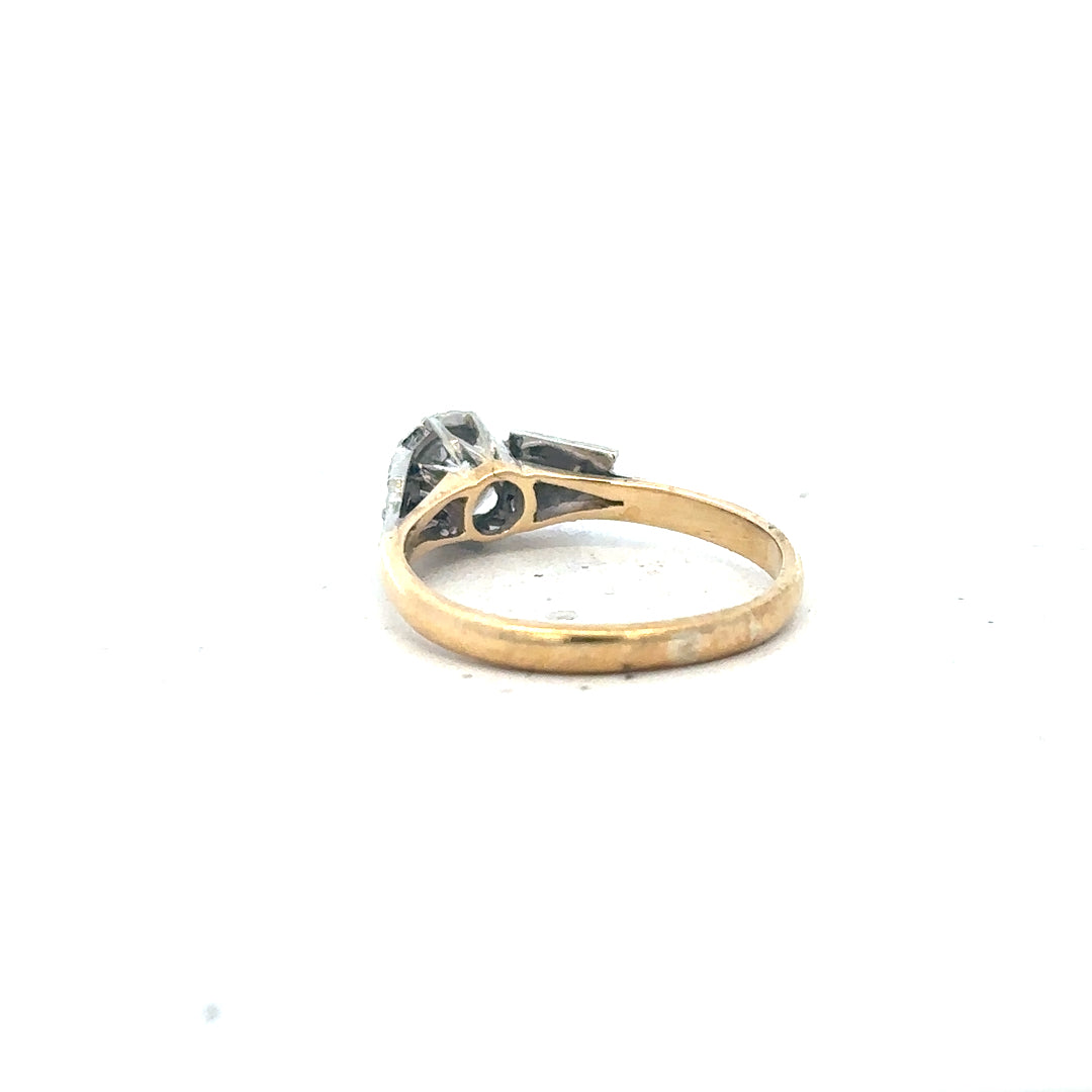 18ct yellow gold diamond ring in size L with sparkling diamonds, showcasing elegant jewelry design.