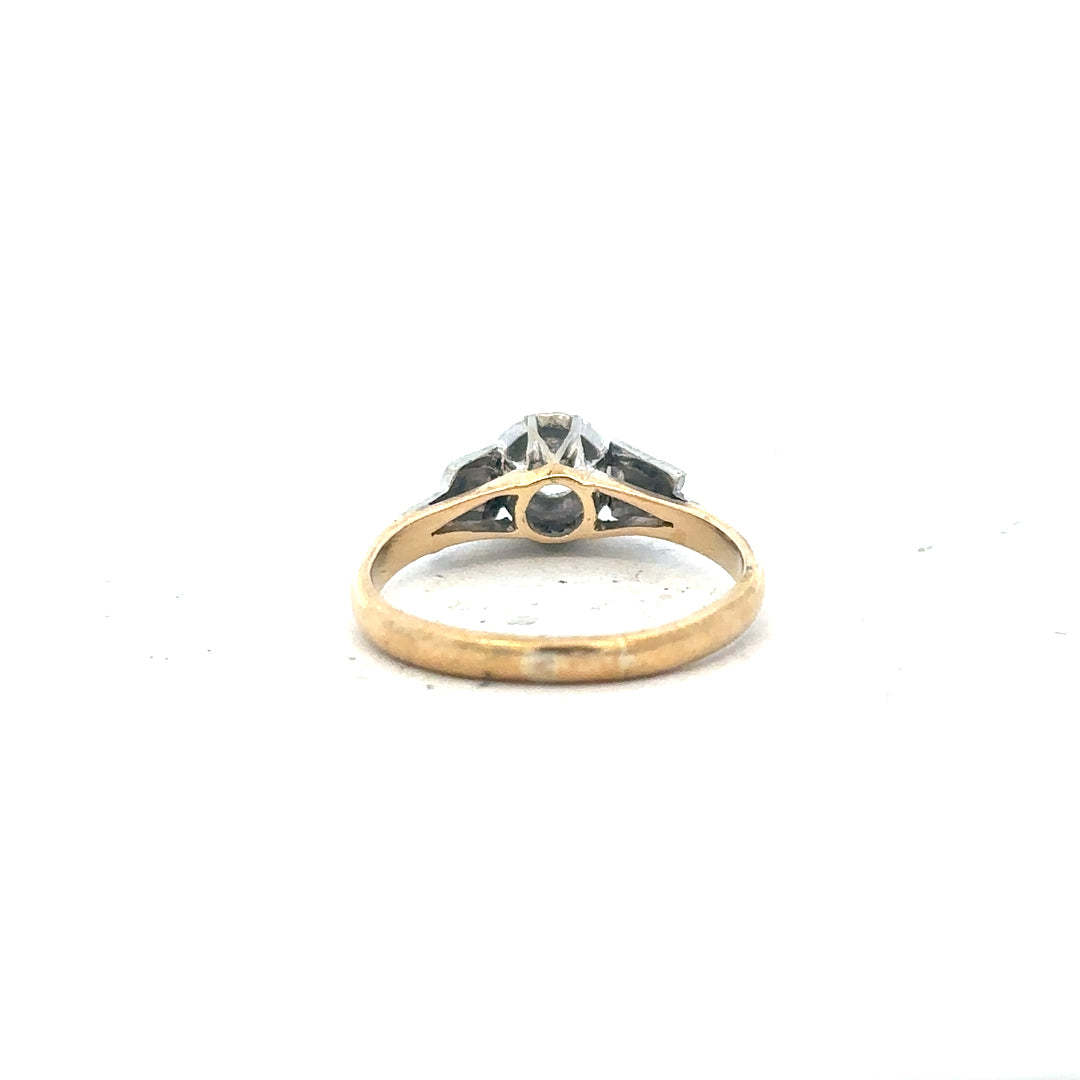 18ct yellow gold diamond ring in size L with sparkling stones, showcasing elegant jewelry design.