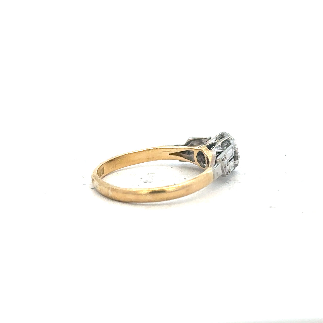 18ct yellow gold diamond ring in size L with sparkling diamonds, showcasing a classic and elegant jewelry design.