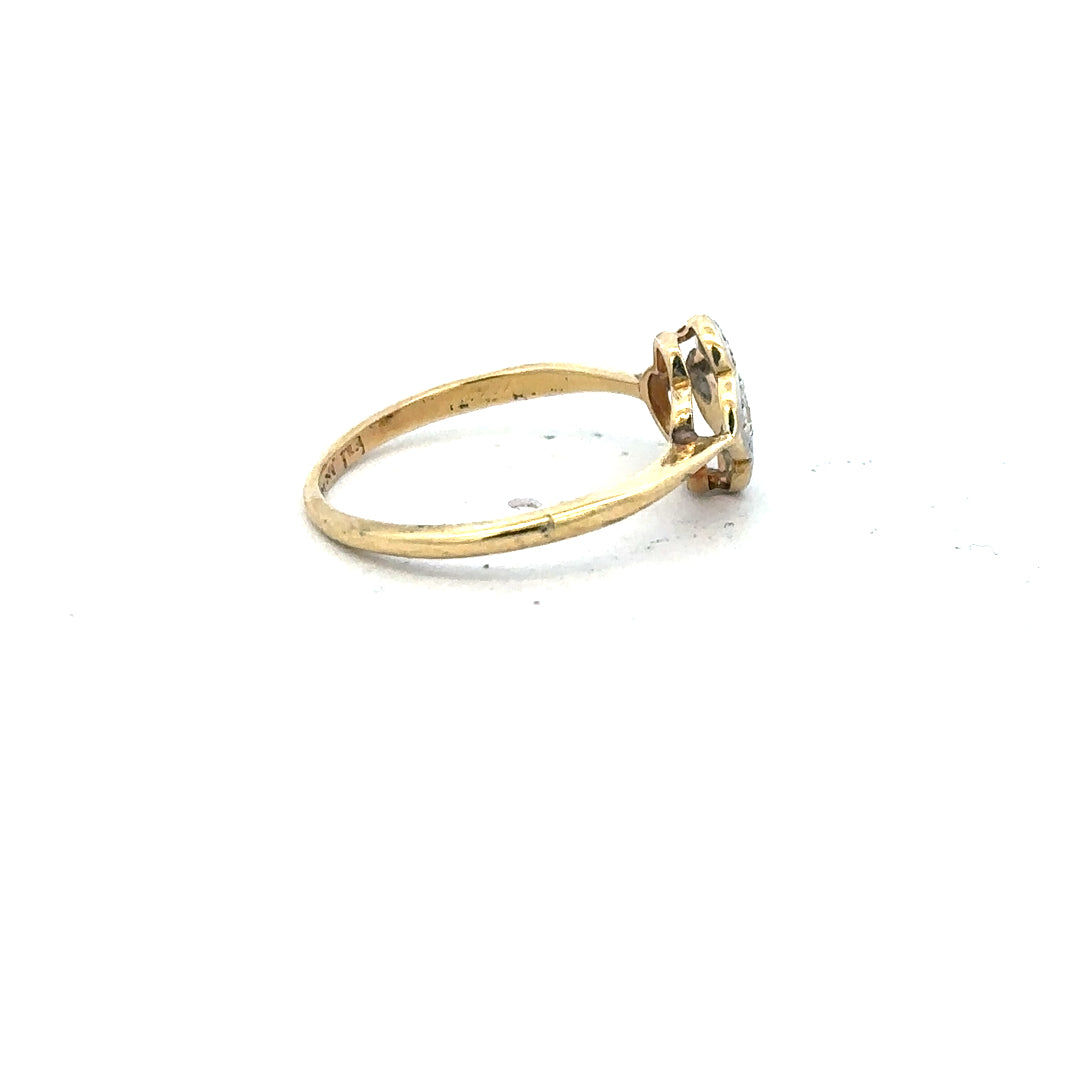 18ct yellow gold diamond ring in size L with sparkling diamonds, showcasing a classic and elegant jewelry piece.