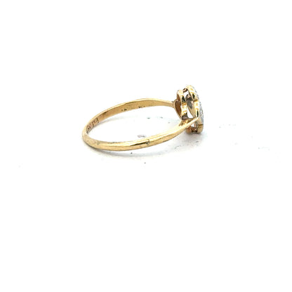 18ct yellow gold diamond ring in size L with sparkling diamonds, showcasing a classic and elegant jewelry piece.