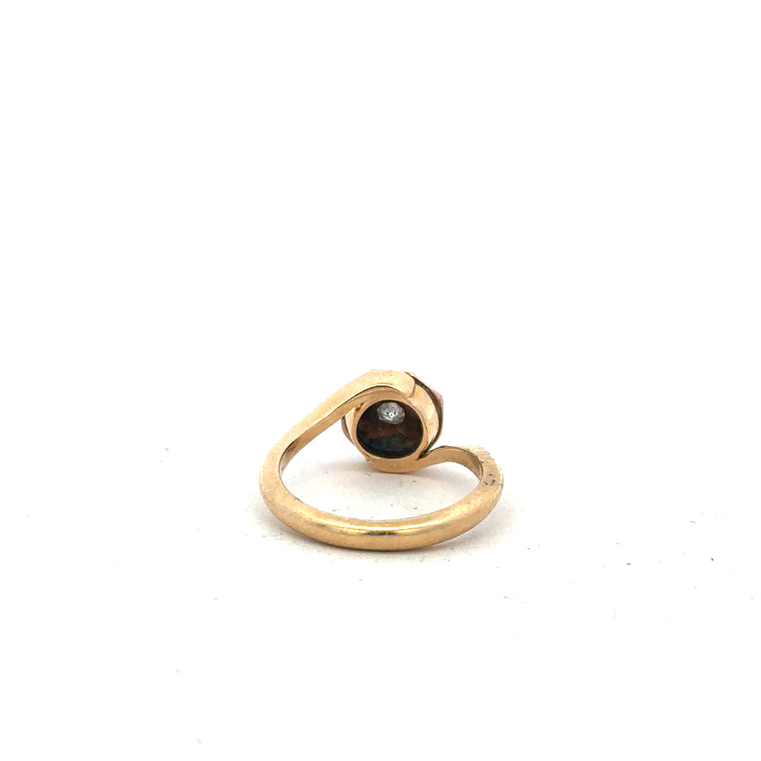 18ct yellow gold diamond ring in size L featuring a sparkling central diamond and a sleek, classic band design.