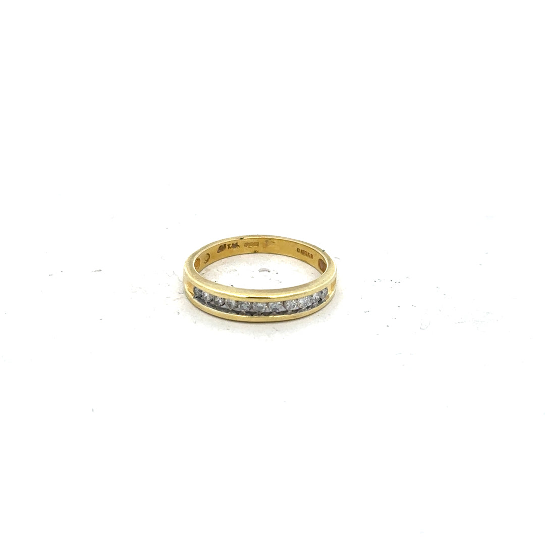 18ct yellow gold diamond ring size L, unbranded, featuring a sparkling diamond set in a smooth gold band.