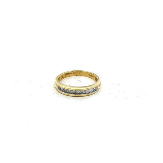 18ct yellow gold diamond ring size L, unbranded, featuring a sparkling diamond set in a smooth gold band.