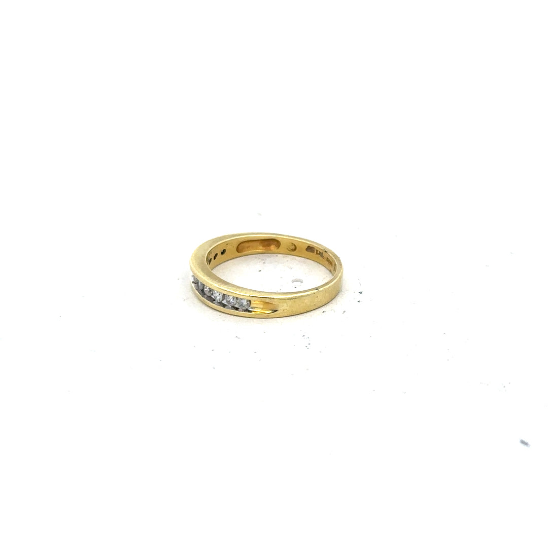 18ct yellow gold diamond ring in size L with a sparkling diamond, unbranded jewelry piece.