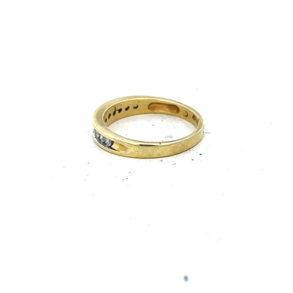 18ct yellow gold diamond ring in size L, featuring a sparkling diamond setting and a smooth band.