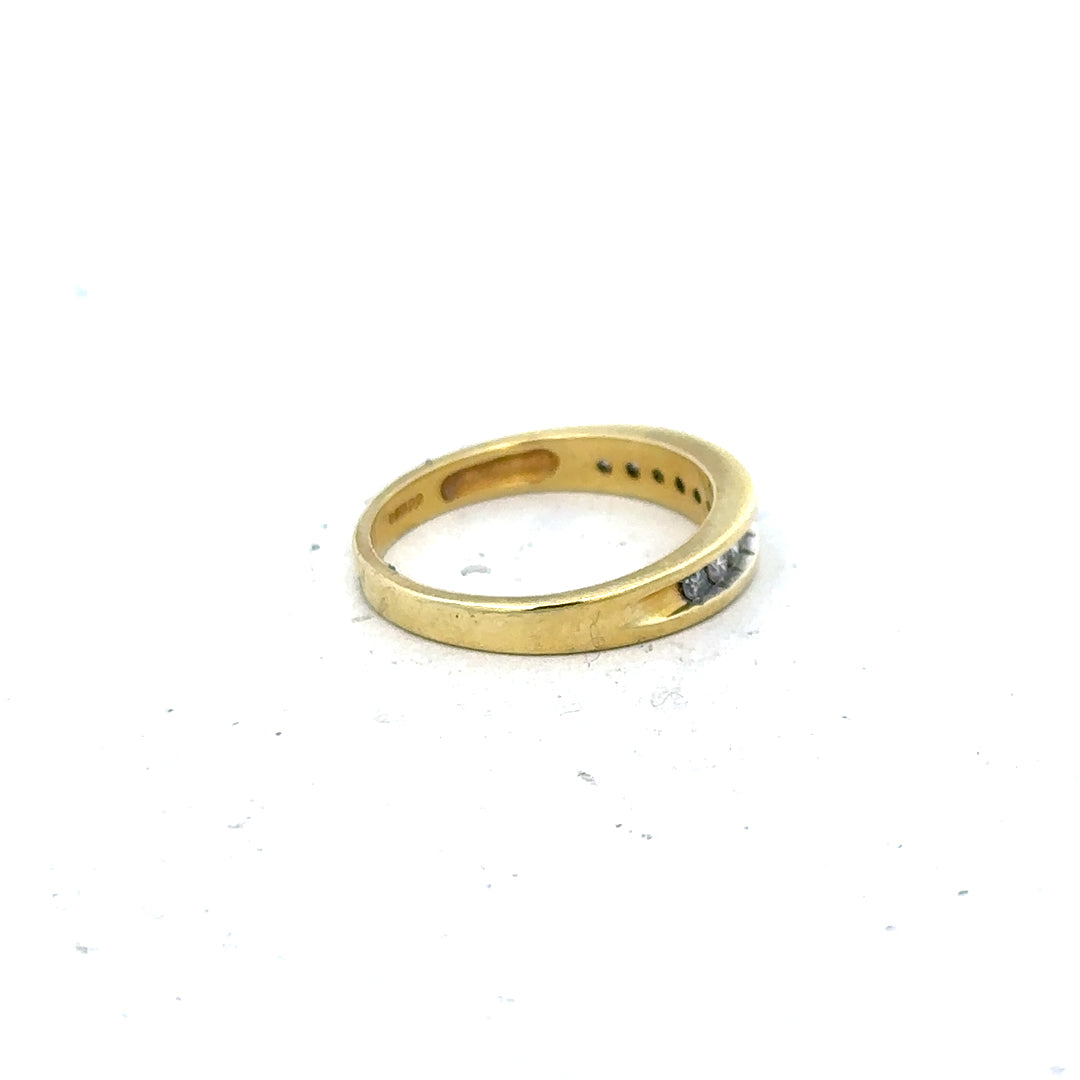 18ct yellow gold diamond ring in size L, featuring a sparkling diamond set in a classic band.