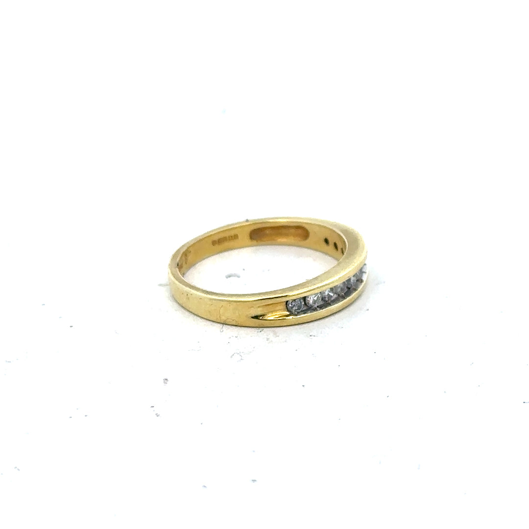 18ct yellow gold diamond ring in size L featuring a sparkling diamond, crafted with elegant and timeless design.
