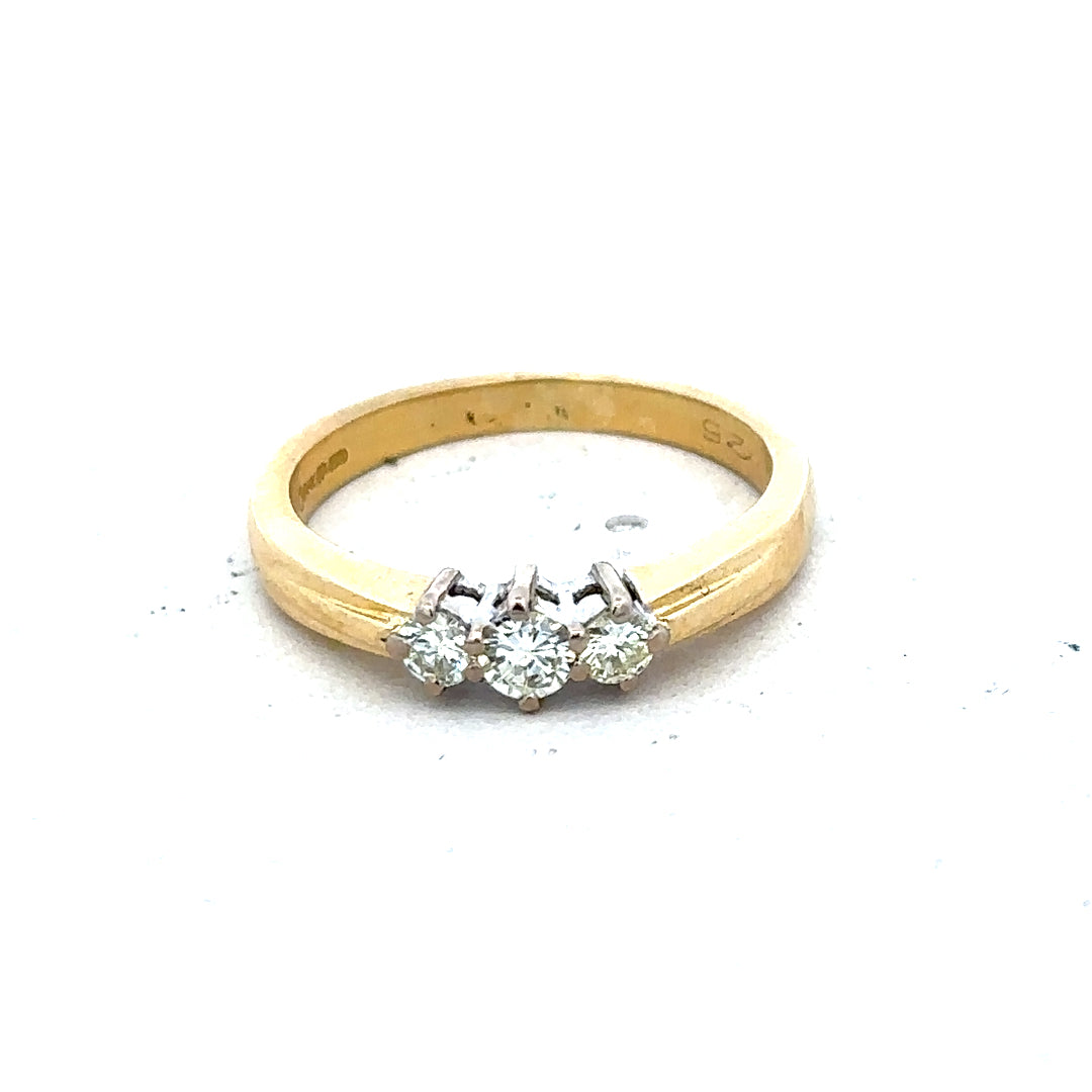 18ct yellow gold diamond ring in size L1/2, featuring a sparkling diamond setting and a classic band design.